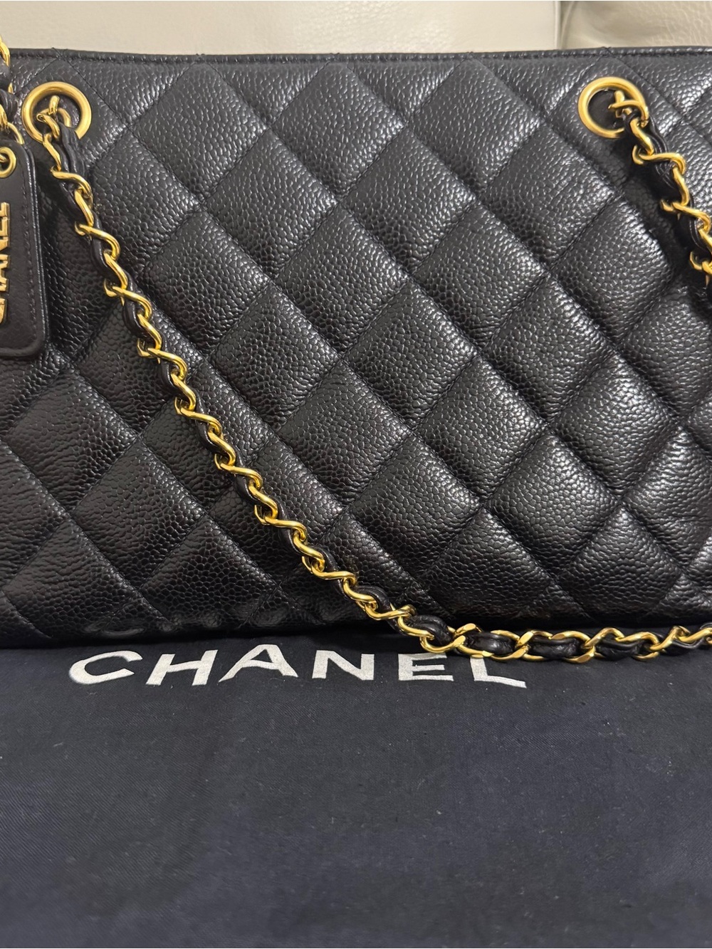 CHANEL VINTAGE Black Quilted Leather Shoulder Bag with 24K GP Chain.